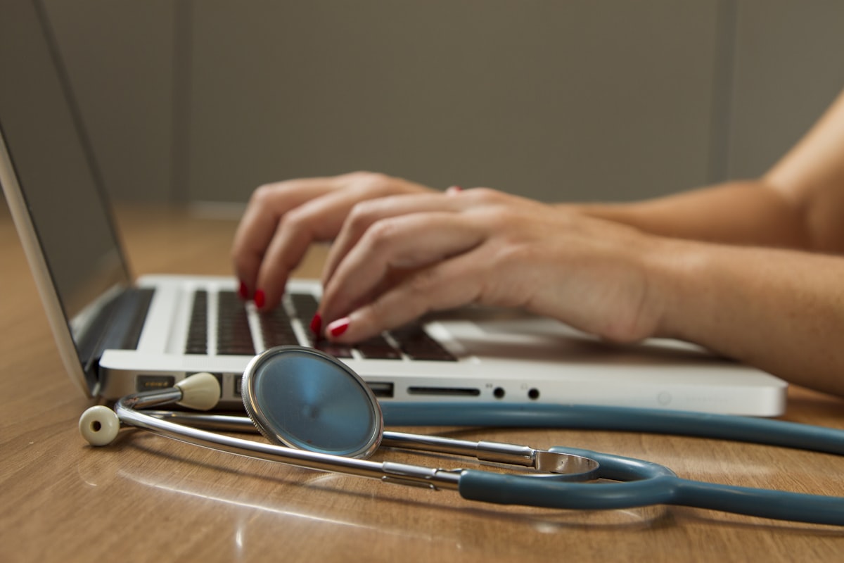 Licensed agent helping a family review ACA health plan options